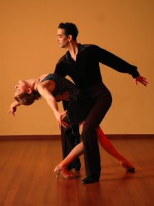 An elegant ballroom dance performance showcasing passion, skill, and grace.